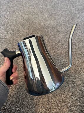 Fellow Stainless Steel Gooseneck Kettle with Black Handle stovetop